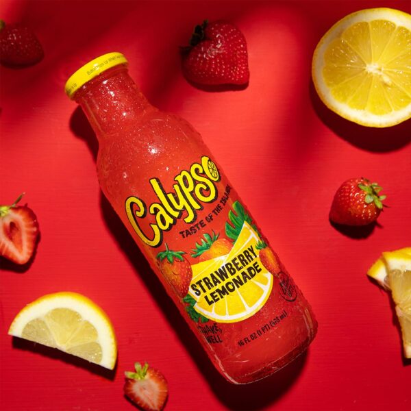 Calypso Strawberry Lemonade surrounded by strawberries and lemon slices.